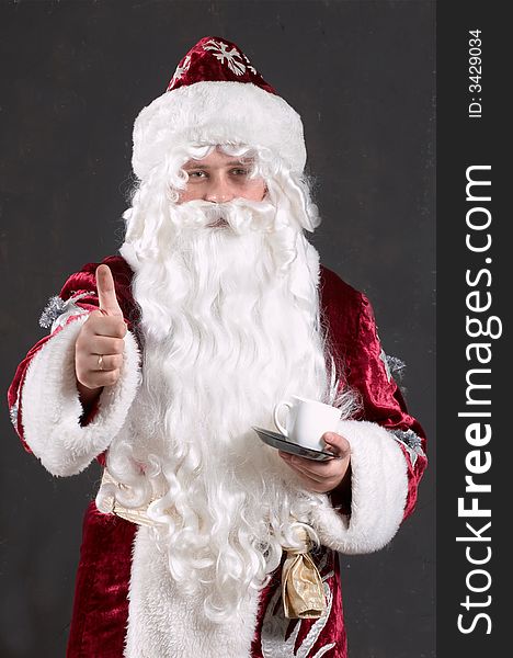 An image of Santa Claus showing thumb