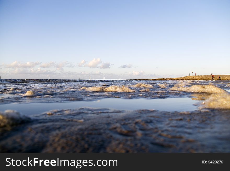 Spume by the north sea beach. Spume by the north sea beach