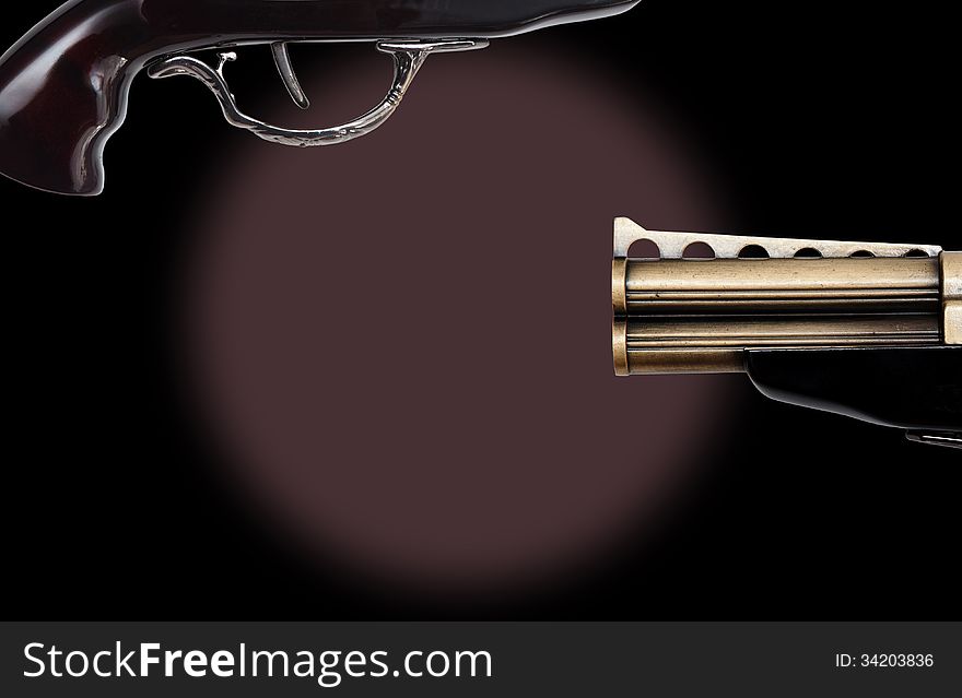 Of Vintage revolver trigger on black background with copy space. Conceptual image for 'pulling the trigger' or initiating action. Of Vintage revolver trigger on black background with copy space. Conceptual image for 'pulling the trigger' or initiating action.