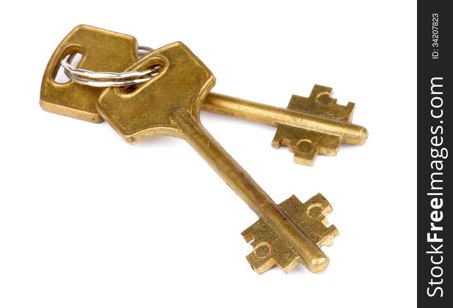 Pair of Old Fashioned Bronze Keys with Ring Lock isolated on white background