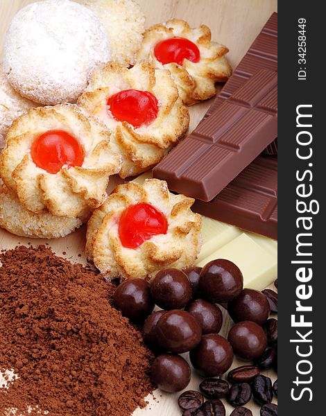 Pastries and chocolate bars in the foreground with overhead shot. Pastries and chocolate bars in the foreground with overhead shot