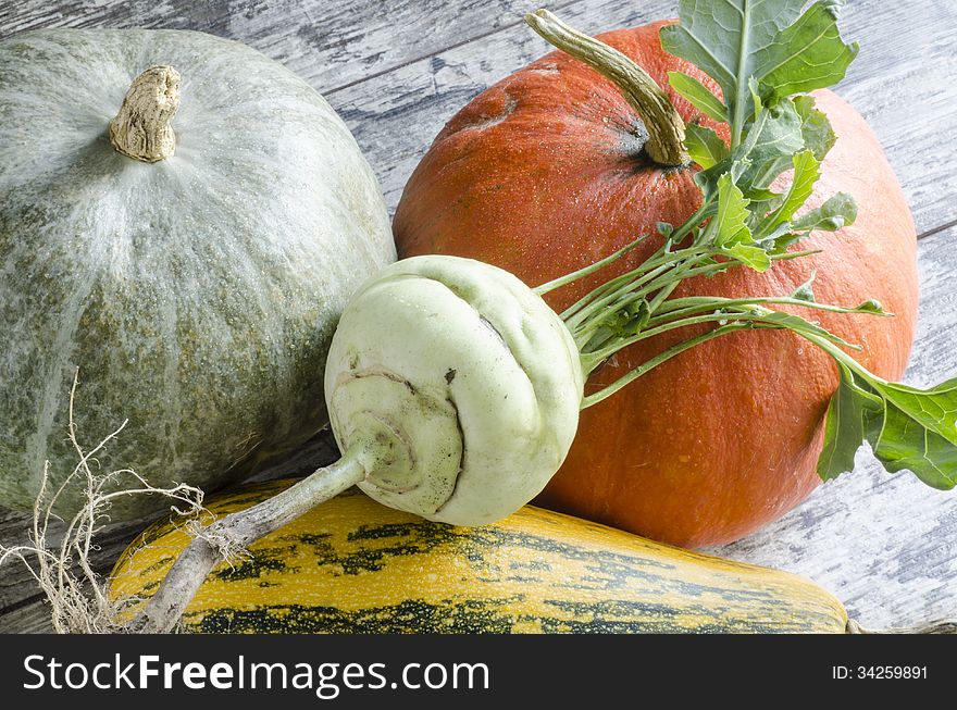 Fresh vegetables on old wooden table, macro