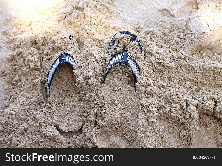 Slippers on the beach