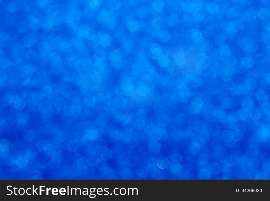 Defocused abstract blue bubble background