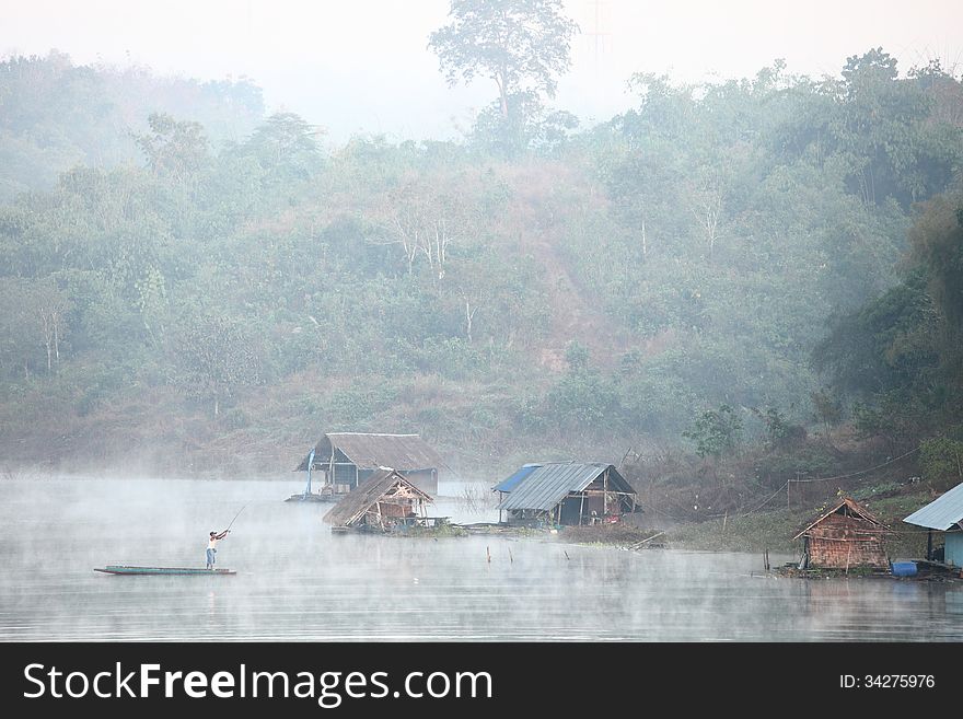 Fishing on the river, the morning mist