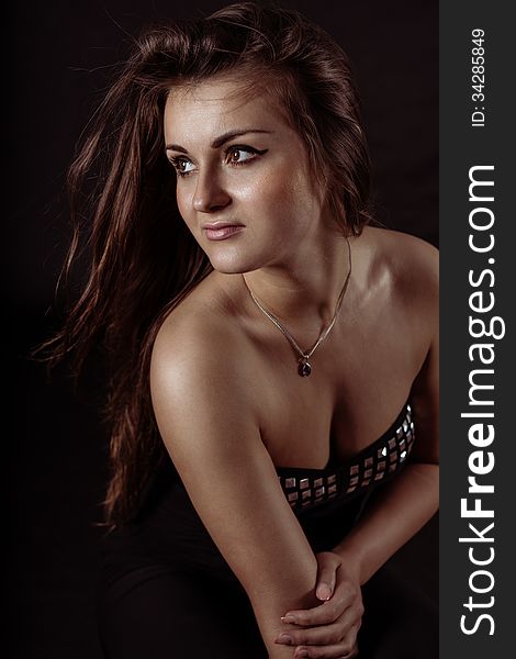 Portrait of sensual romantic beautiful girl on black background