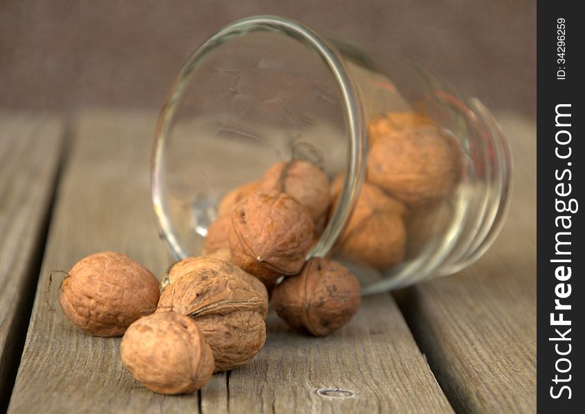 Walnuts pour out from the up