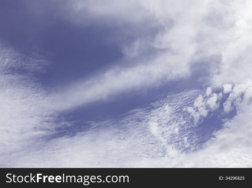 Feather clouds closeup blue mix