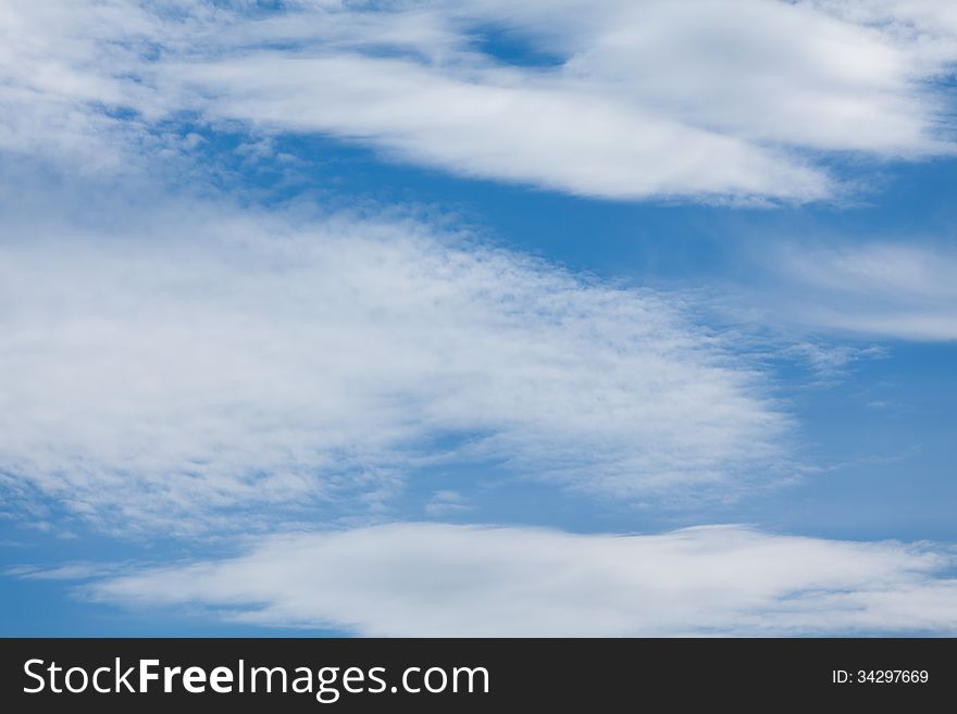 Feather clouds closeup blue mix