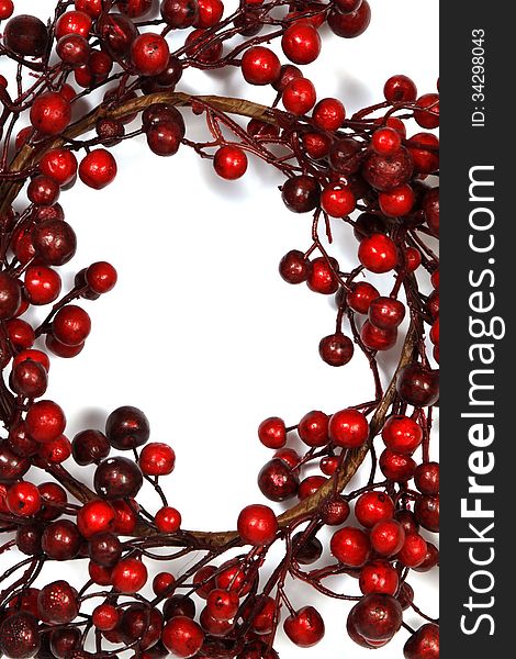 Christmas wreath from red berries isolated on white background