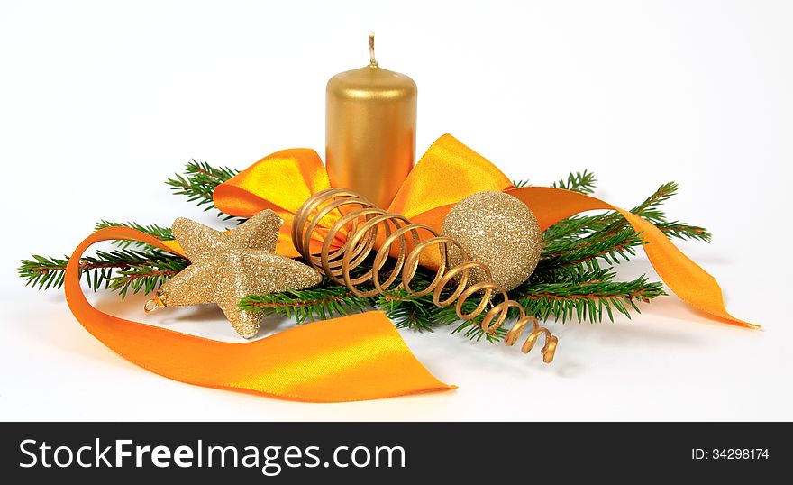 Christmas decoration with the yellow ribbon and candle