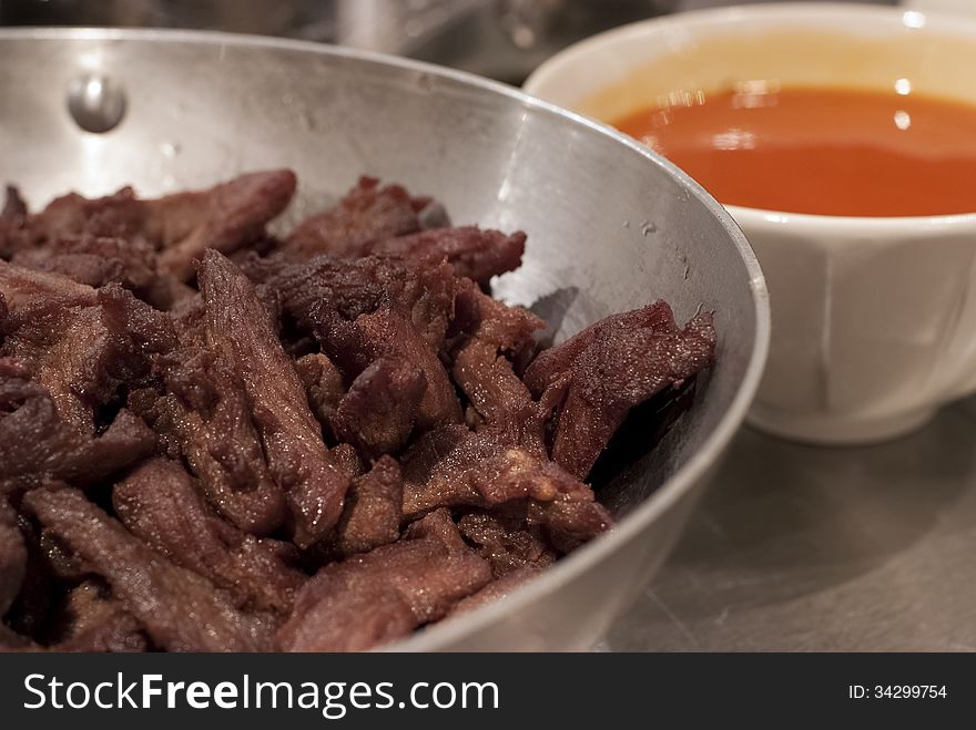 Fried minced pork ready to be served with chilli dip