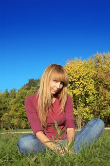 Blond Relaxing On The Grass Royalty Free Stock Photography Blond Relaxing On The Grass Royalty Free Stock Photography