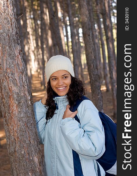 Beautiful winter girl in blue jacket