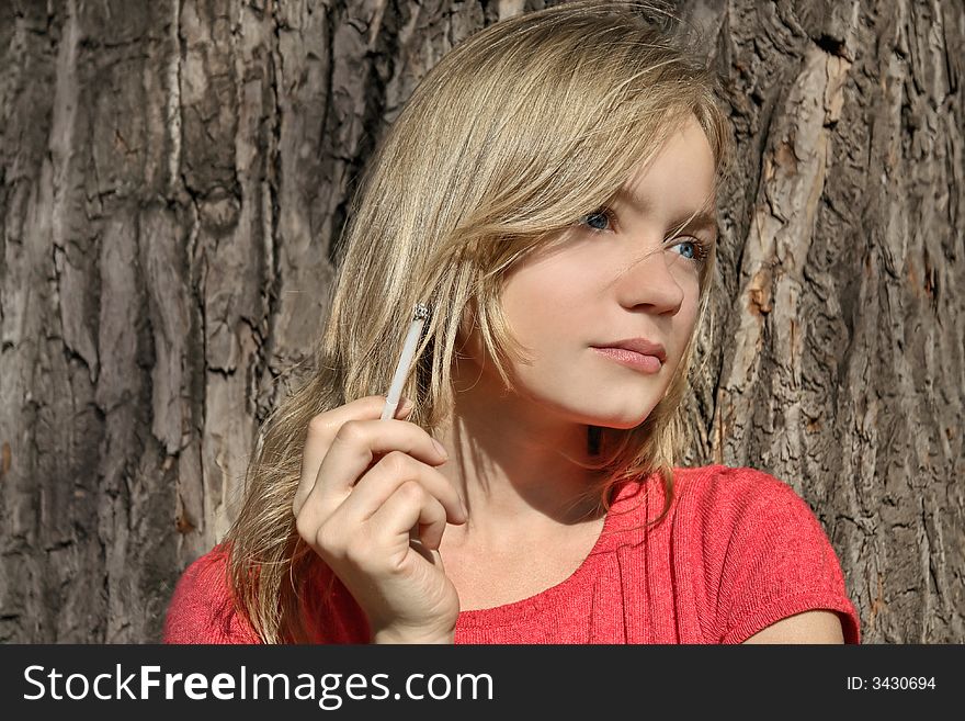 Blond girl with a cigarette