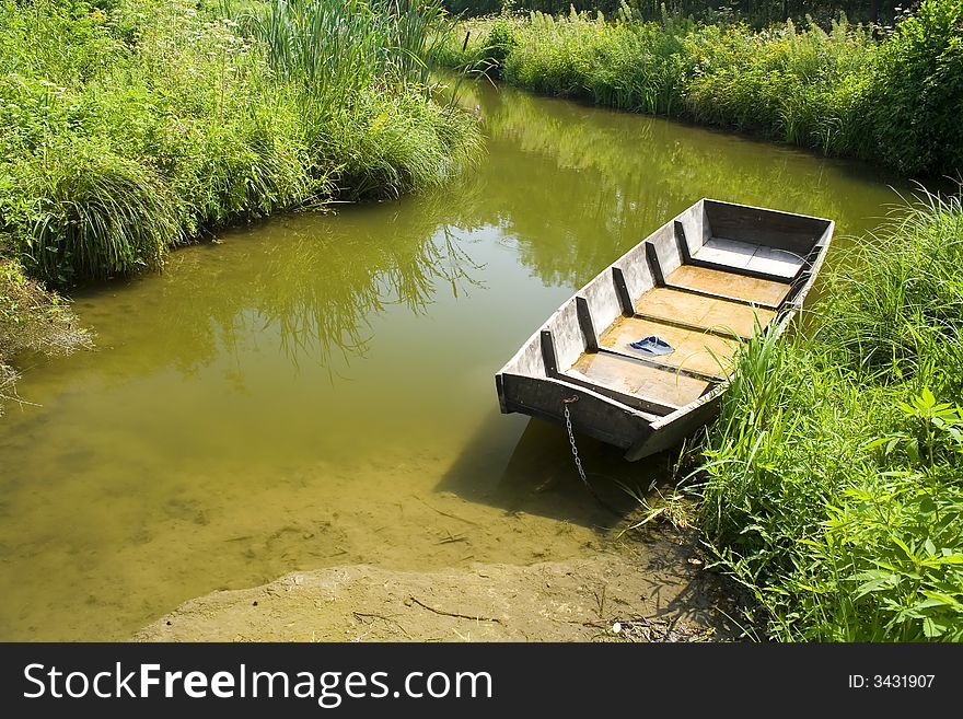 Boat detail in pond, River Drava, Croatia