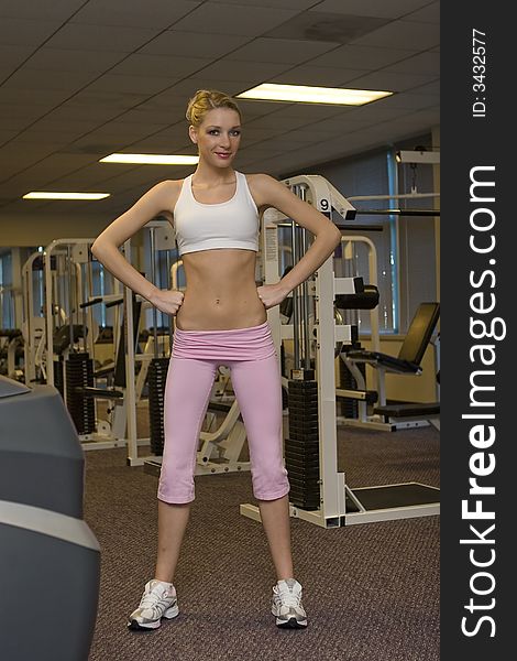 A lovely young blonde woman working out. A lovely young blonde woman working out