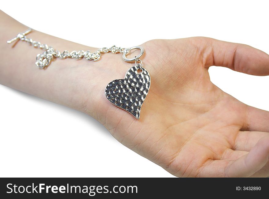 Isolated hand and silver heart. Isolated hand and silver heart