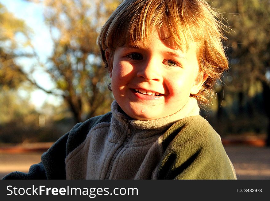 Portrait of a little boy playing outdoors. Portrait of a little boy playing outdoors