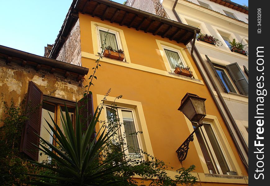 Roma-yellow house with lantern.