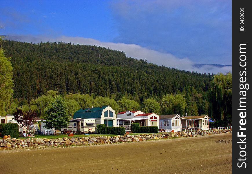 A view of the waterfront homes at Mara Lake, BC, Canada. This lake is located between Sicamous and Salmon Arm in the Okanagan - North Shuswap Region in British Columbia, Canada. A view of the waterfront homes at Mara Lake, BC, Canada. This lake is located between Sicamous and Salmon Arm in the Okanagan - North Shuswap Region in British Columbia, Canada.