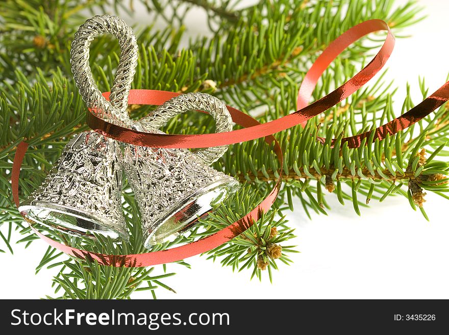 Decorative silver bell with christmas tree