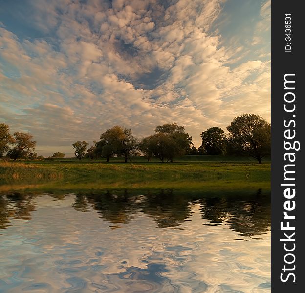 Summer meadow and river