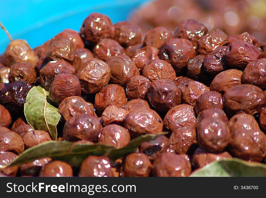 Closeup of fresh salted olives on the market.