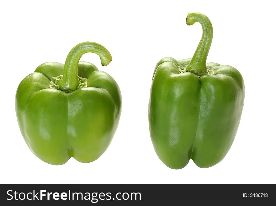 Two green pepper on white background