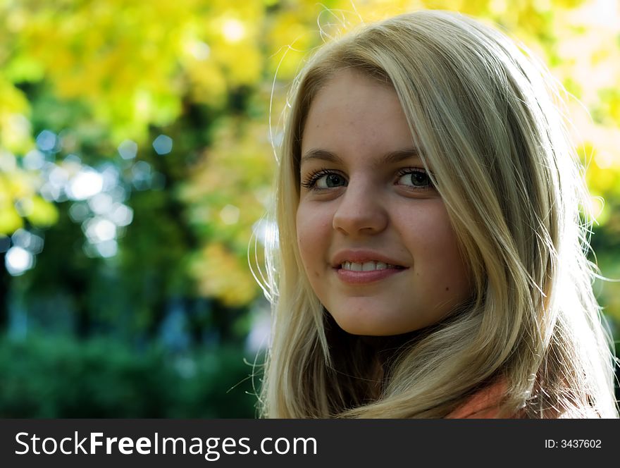 Portret of cute girl in park. Autumn. Portret of cute girl in park. Autumn.