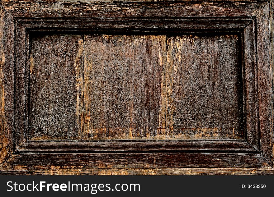 Old teak  wooden panel detail. Old teak  wooden panel detail