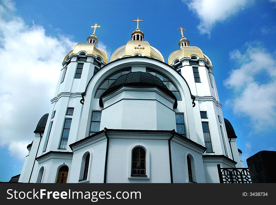 Orthodox temple in the midst of a blue sky