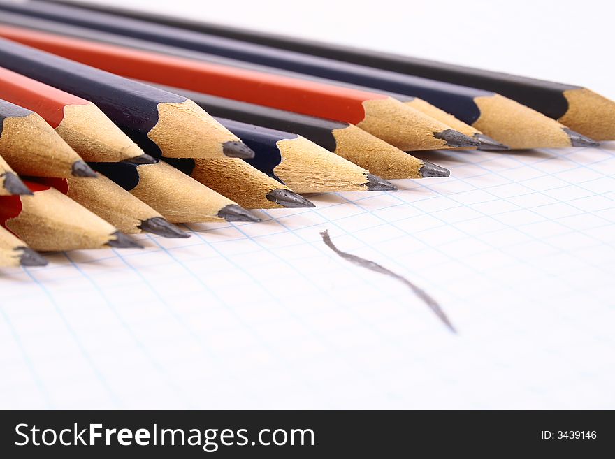 Pencil on white isolated background