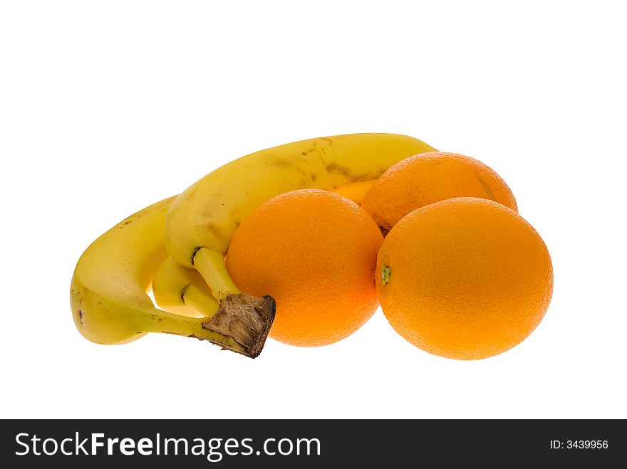 Fresh oranges and banana isolated on a white background