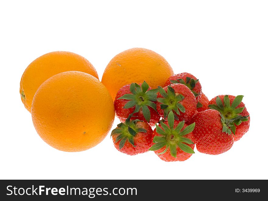 Fresh oranges and strawberries isolated on a white background