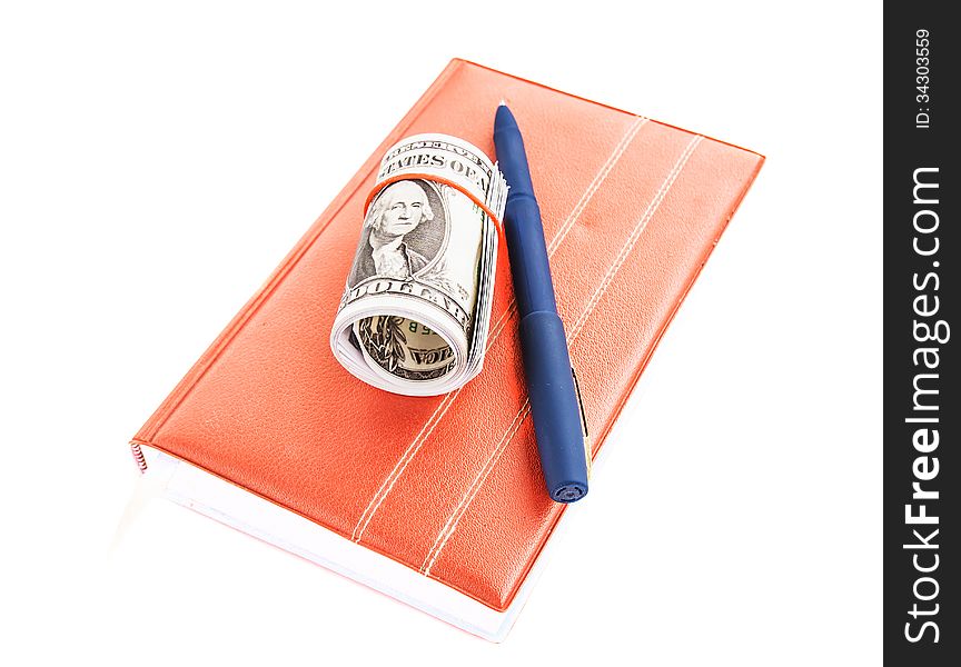 Book, dollars and pen isolated on a white background. Book, dollars and pen isolated on a white background
