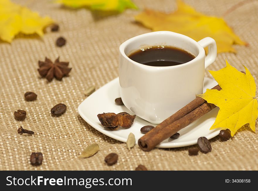 Cup of coffee and yellow leaves. Cup of coffee and yellow leaves