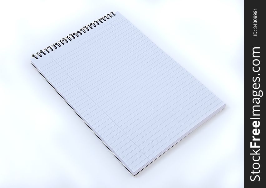 Spiral note pad ready to write notes on. Spiral note pad ready to write notes on