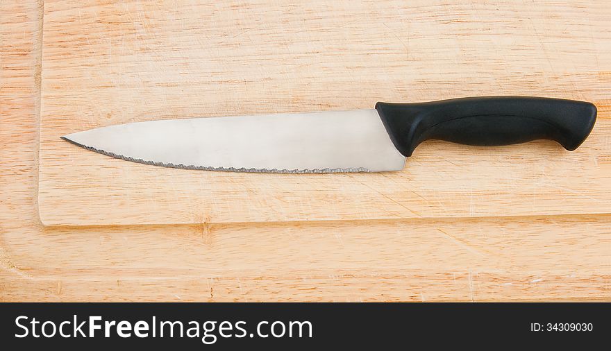 Carving knife set on cutting board. Carving knife set on cutting board