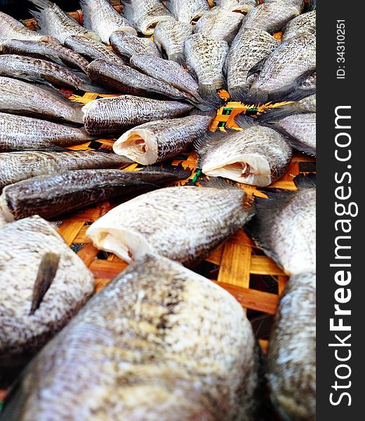 Drying snakeskin gourami fishes in local market, Thailand