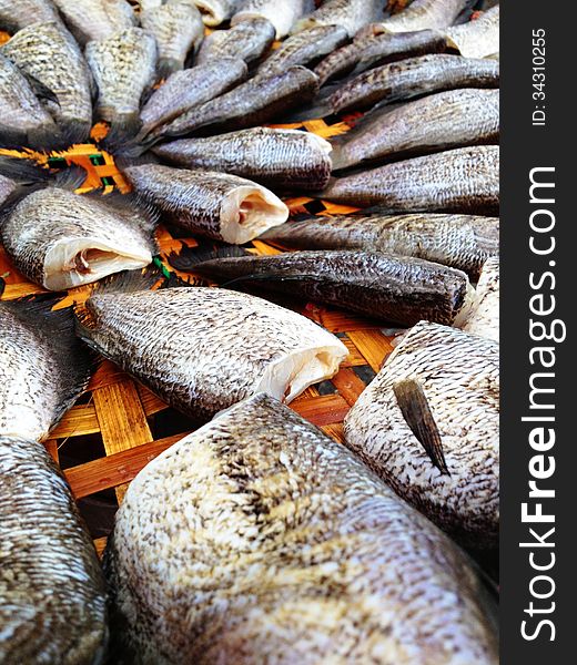 Drying snakeskin gourami fishes in local market, Thailand