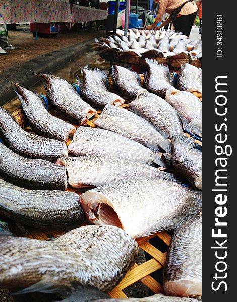 Drying snakeskin gourami fishes in local market, Thailand