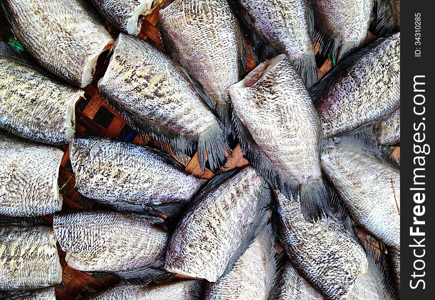 Drying snakeskin gourami fishes in local market, Thailand