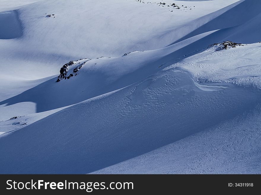 Snow and shadows on the mountain slop. Chile. Snow and shadows on the mountain slop. Chile