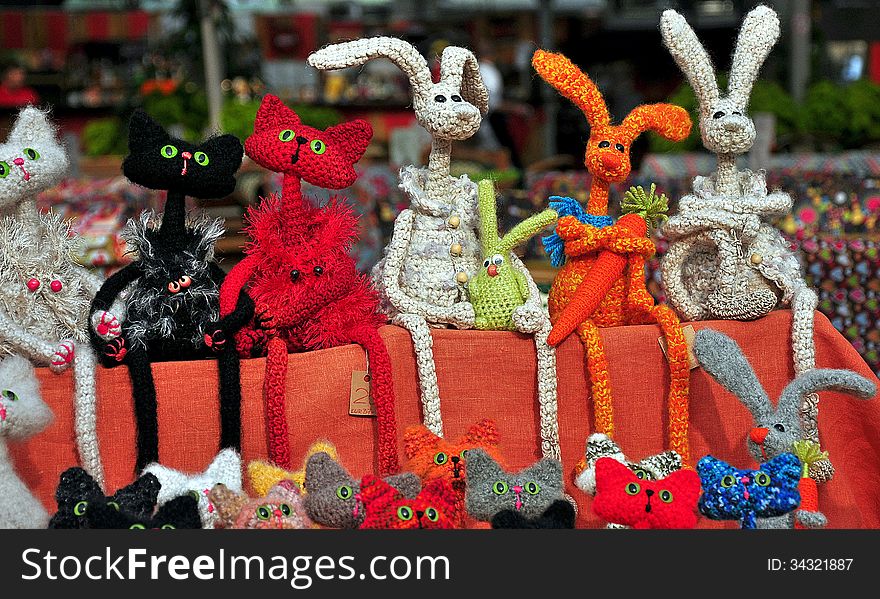 Knitted crafts handmade cats and rabbits