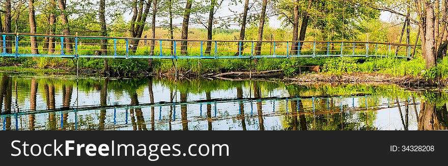 Suspension Bridge Through A Reservoir