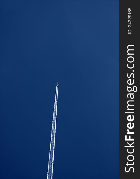 Plane in the blue sky background. Plane in the blue sky background