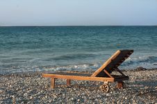 Wooden Chair On The Beach Stock Photos Wooden Chair On The Beach Stock Photos