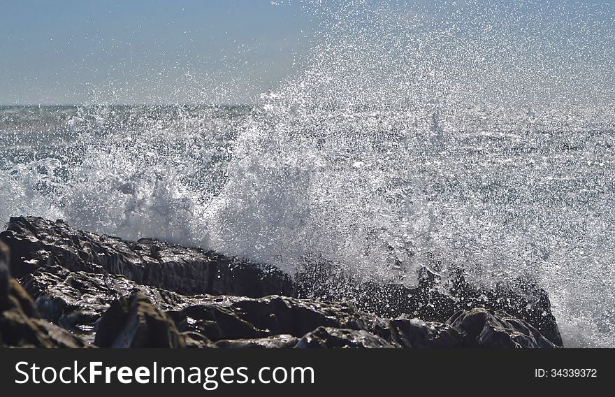 Landscape with waves crashing agains rocks. Landscape with waves crashing agains rocks