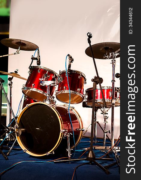 Red drum set on the stage in a party. Red drum set on the stage in a party